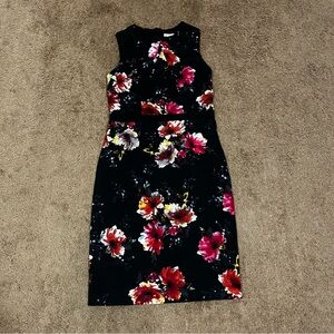 Mid length dress, with beautiful flowers from DB Established 1962.